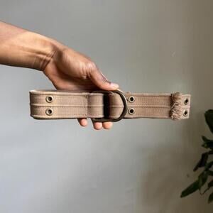 Grunge grommet grunge‎ belt with adjustable buckle